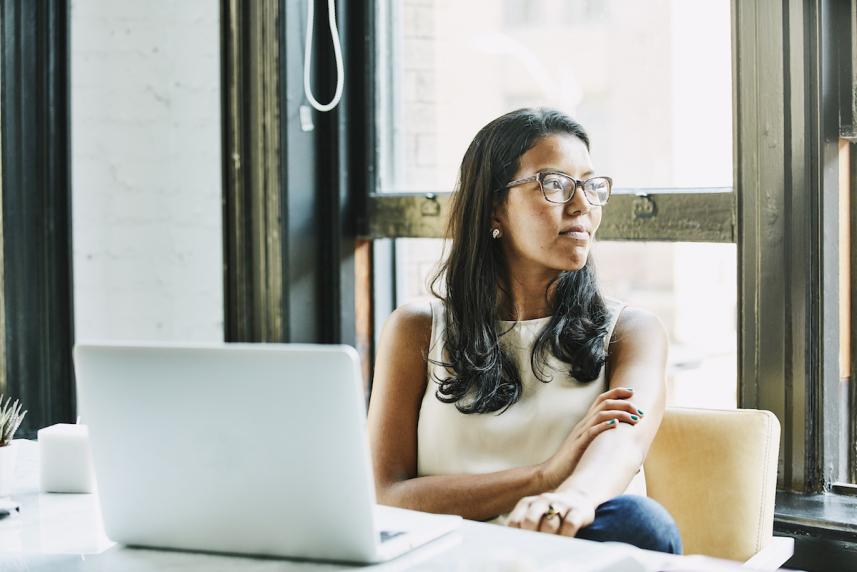 woman working next to window