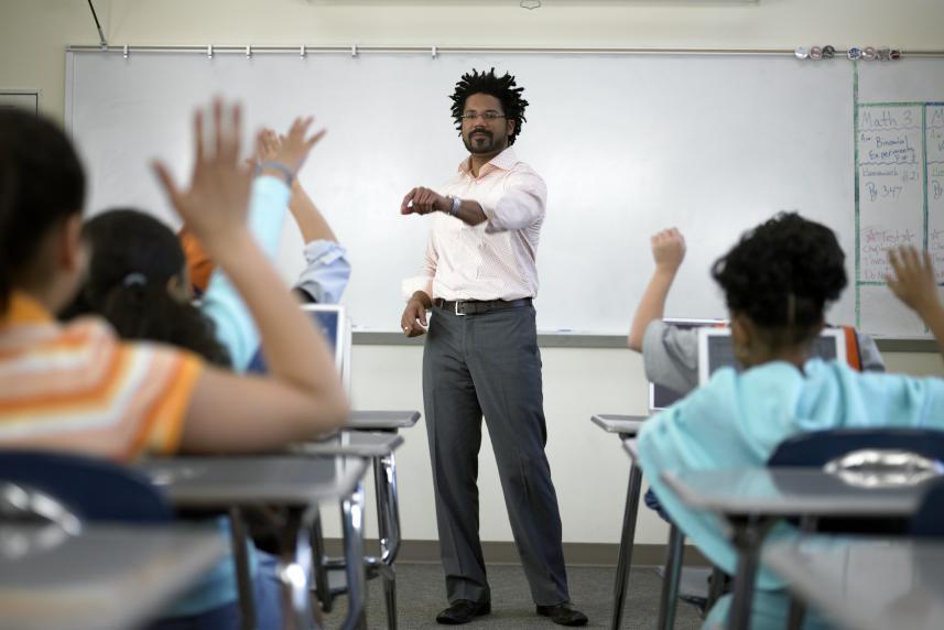 A man teaching students