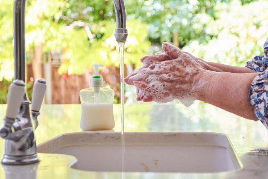 Woman washing her hands